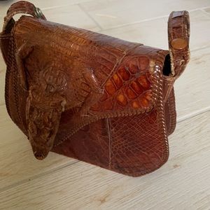 Antique alligator bag in need of TLC
